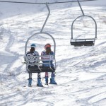 World Cup Ski Racers World Cup Ski Racers ride the lift during practice on Aspen Mountain.