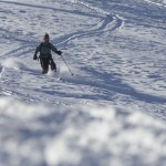 Buttermilk Telemark Skier Photograph A skier of the telemark variety gets some earned turns on a sunny afternoon.